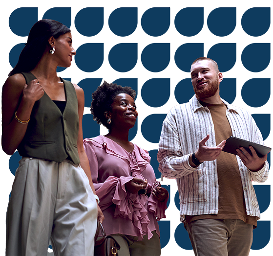 Three people smiling and chatting together